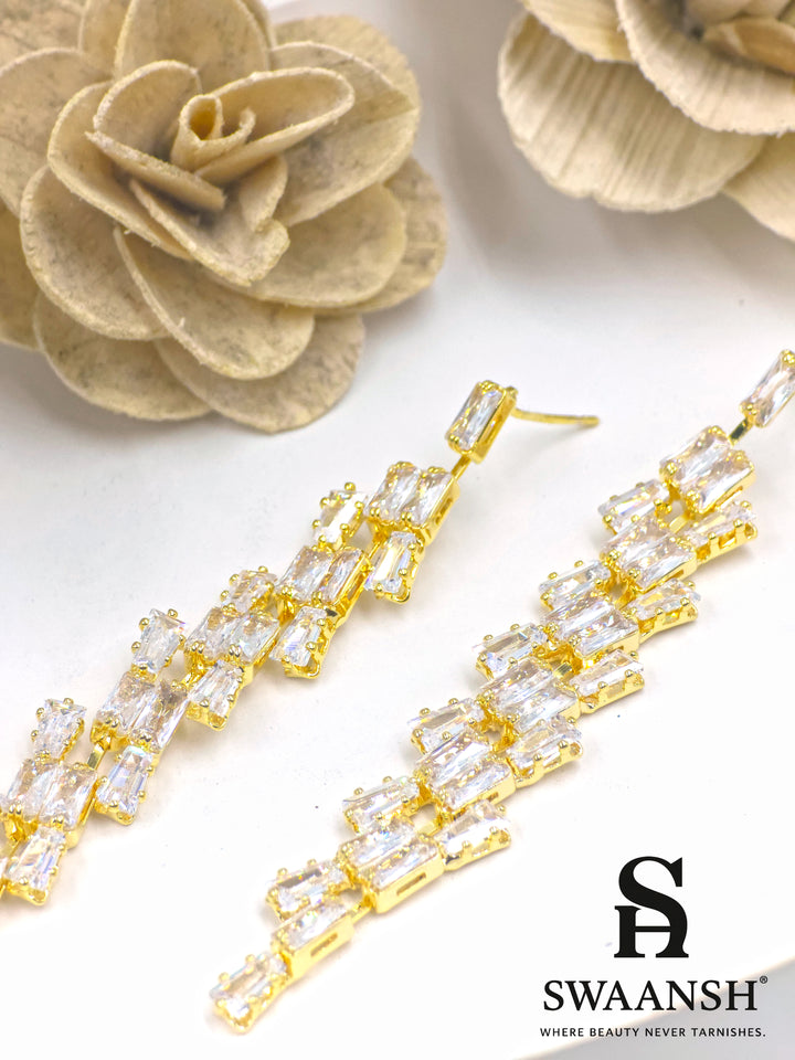 Gold long drop earrings with angular baguette-cut zirconia cascade – Swaansh