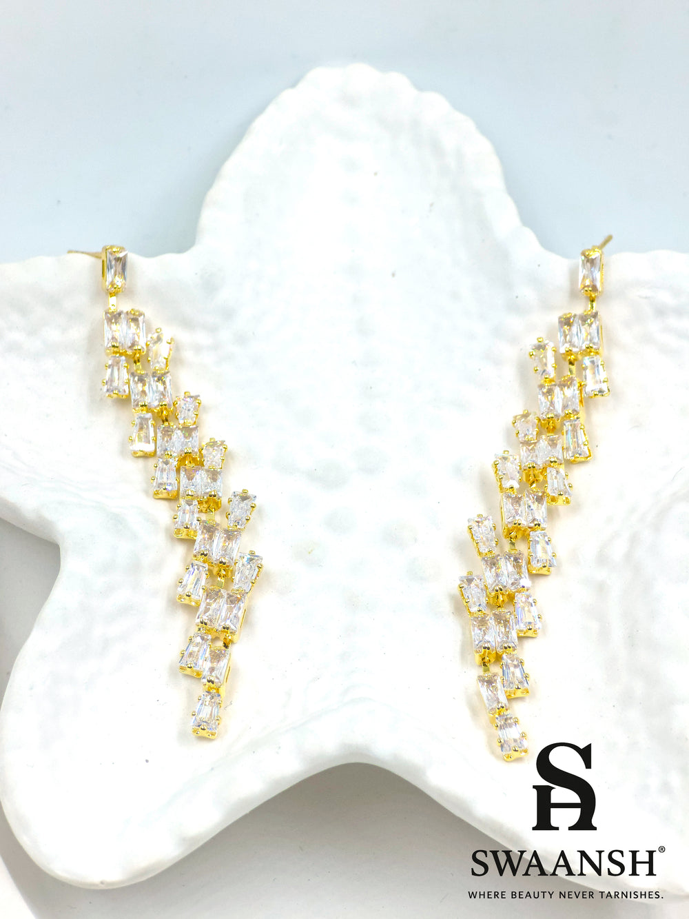 Gold long drop earrings with angular baguette-cut zirconia cascade – Swaansh