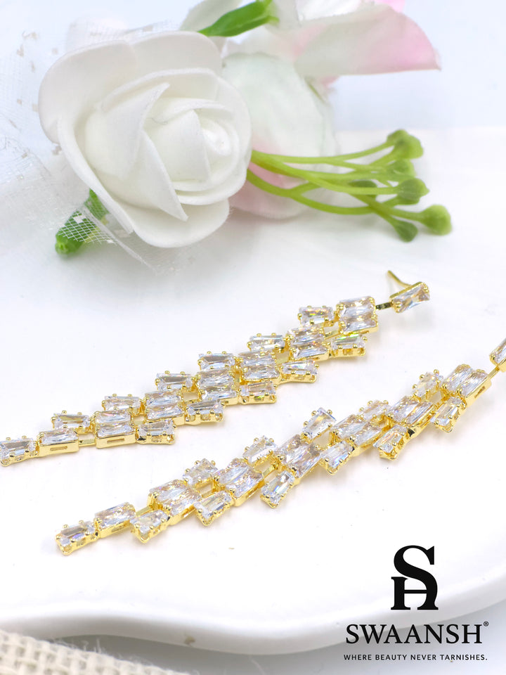 Gold long drop earrings with angular baguette-cut zirconia cascade – Swaansh
