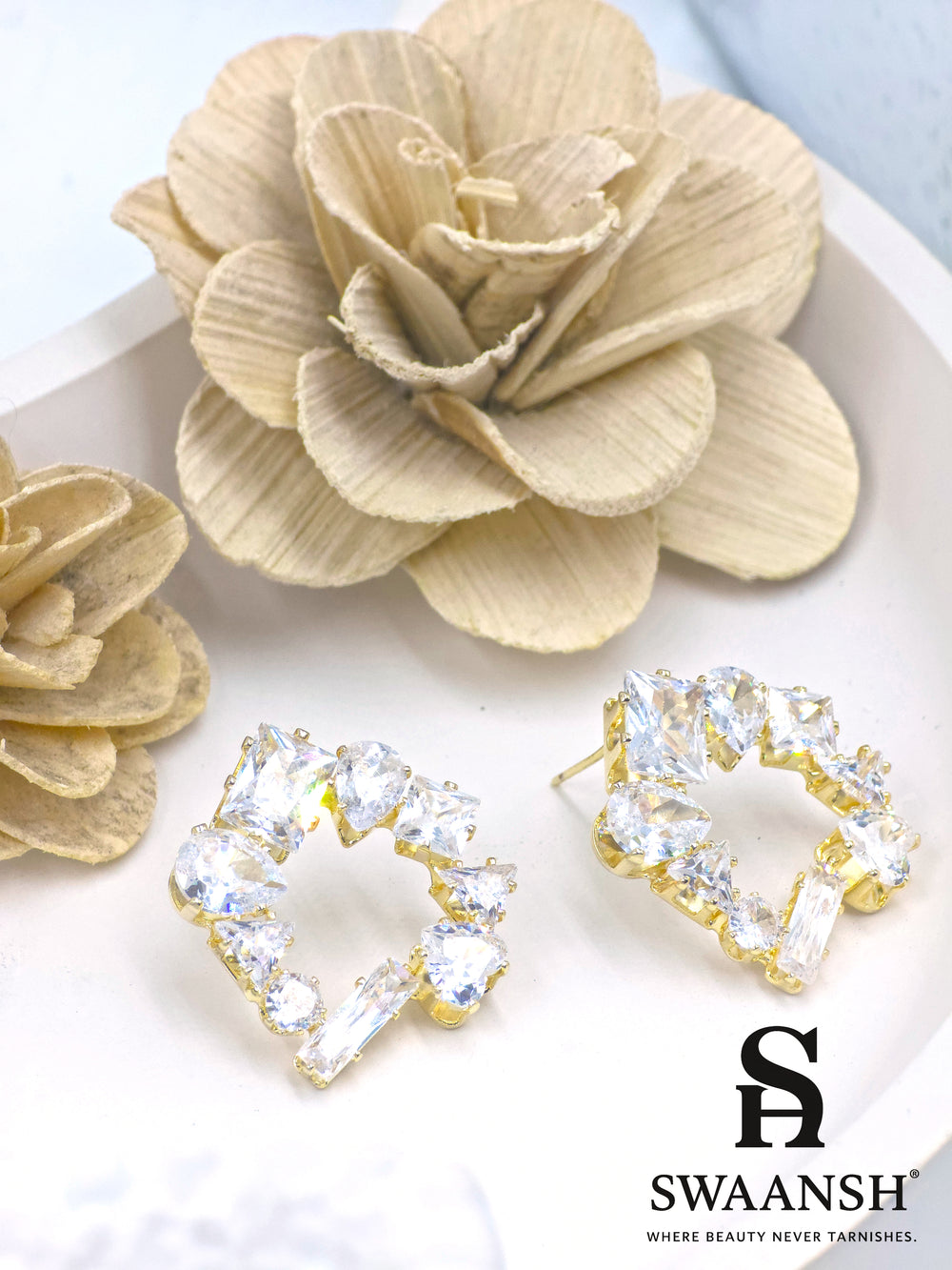 Gold open frame stud earrings with mixed-cut zirconia in asymmetric geometric design – Swaansh