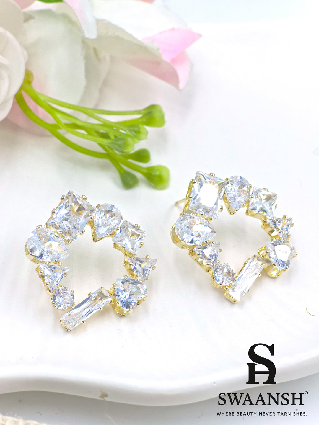 Gold open frame stud earrings with mixed-cut zirconia in asymmetric geometric design – Swaansh