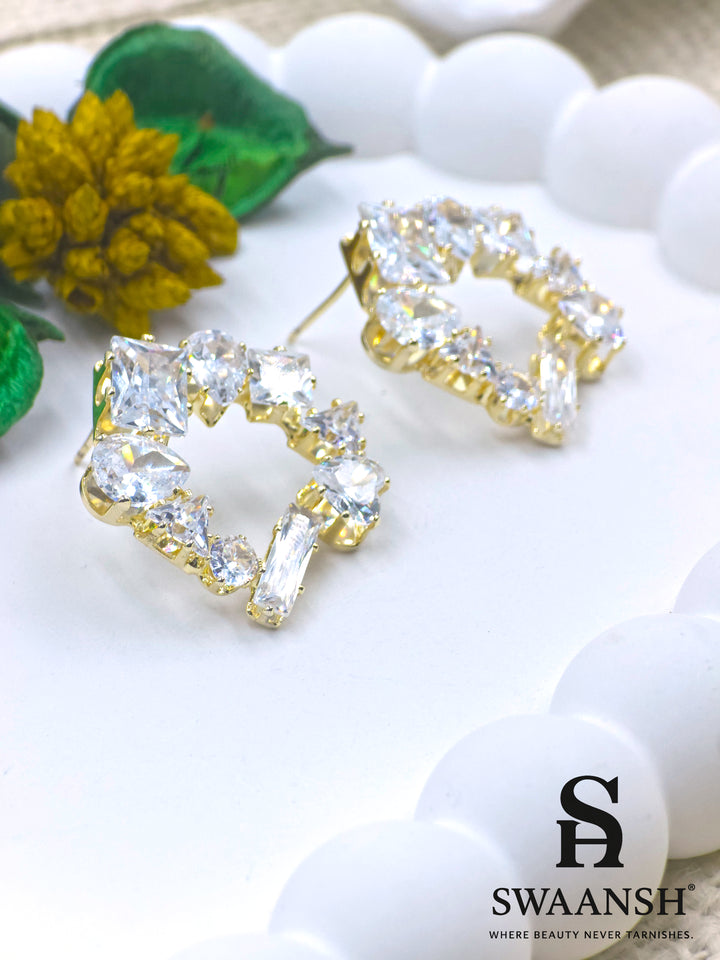 Gold open frame stud earrings with mixed-cut zirconia in asymmetric geometric design – Swaansh