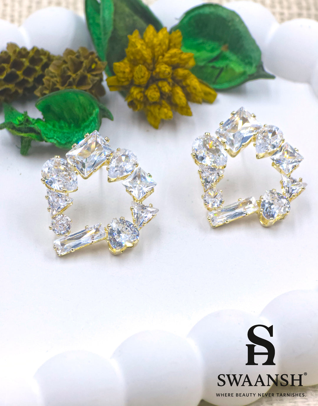 Gold open frame stud earrings with mixed-cut zirconia in asymmetric geometric design – Swaansh
