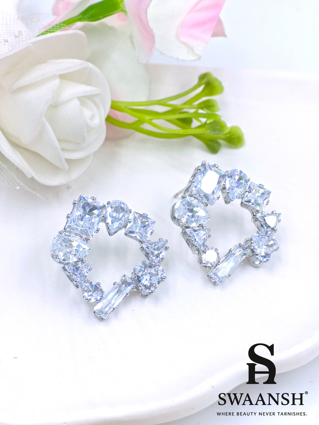 Asymmetric silver open-stud earrings with mixed zirconia cuts – Swaansh