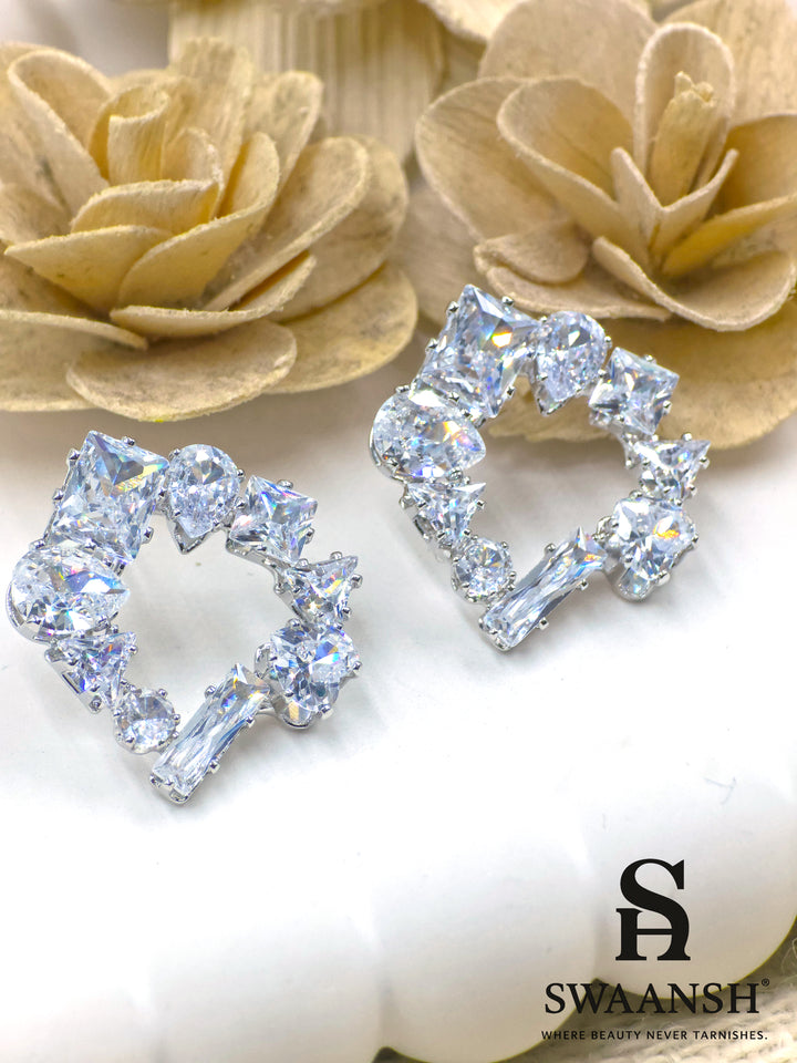 Asymmetric silver open-stud earrings with mixed zirconia cuts – Swaansh