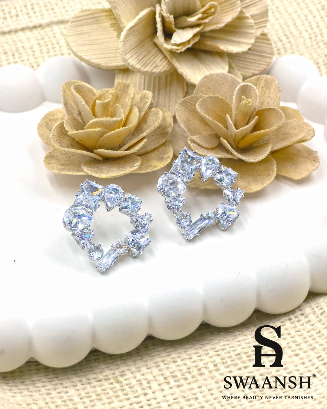 Asymmetric silver open-stud earrings with mixed zirconia cuts – Swaansh
