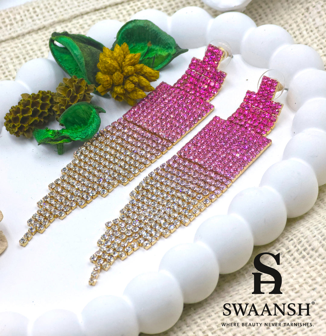 Long ombre tassel earrings transitioning from deep pink to champagne crystals on gold base – Swaansh