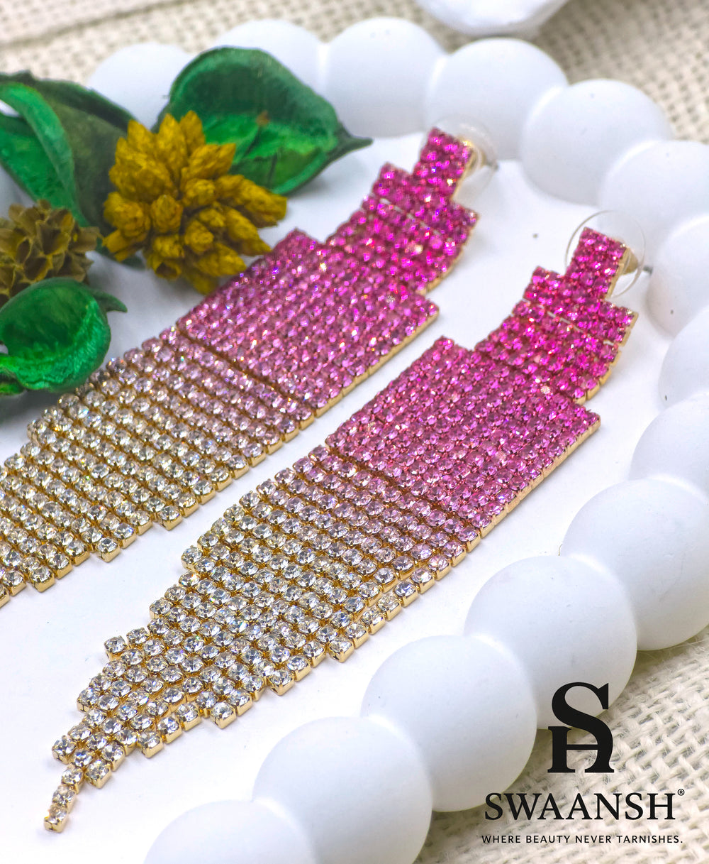 Long ombre tassel earrings transitioning from deep pink to champagne crystals on gold base – Swaansh