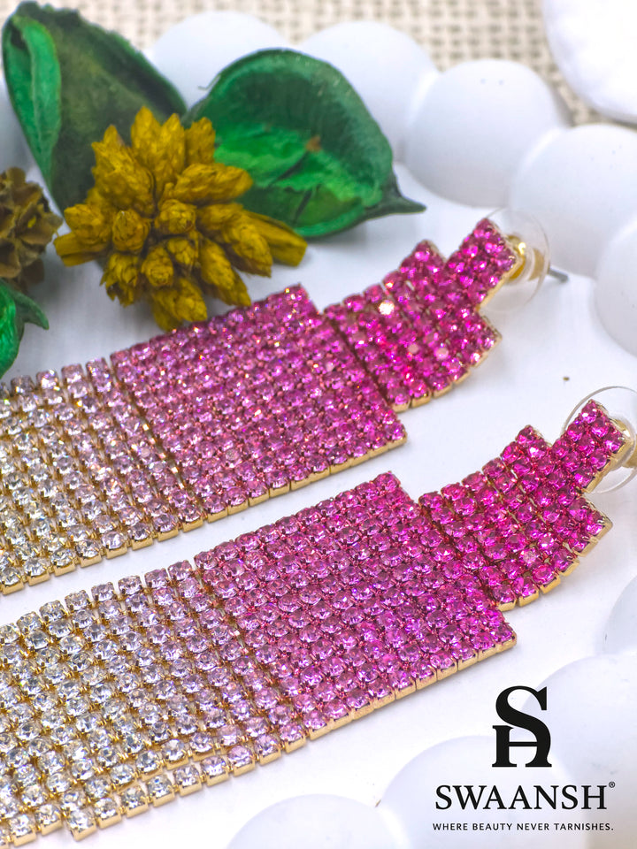 Long ombre tassel earrings transitioning from deep pink to champagne crystals on gold base – Swaansh