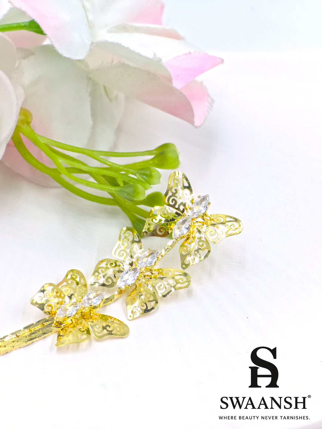 Gold butterfly filigree earrings with zirconia accents and long tassel chains – Swaansh