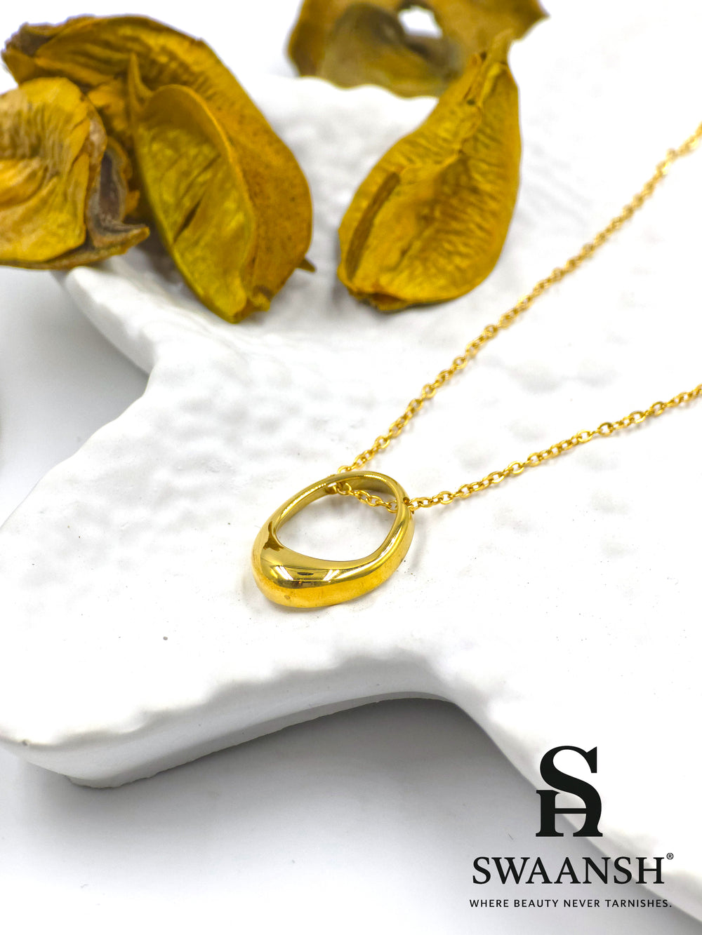 Sculpted gold crescent-shaped loop pendant on delicate chain – Crescent Drape by Swaansh