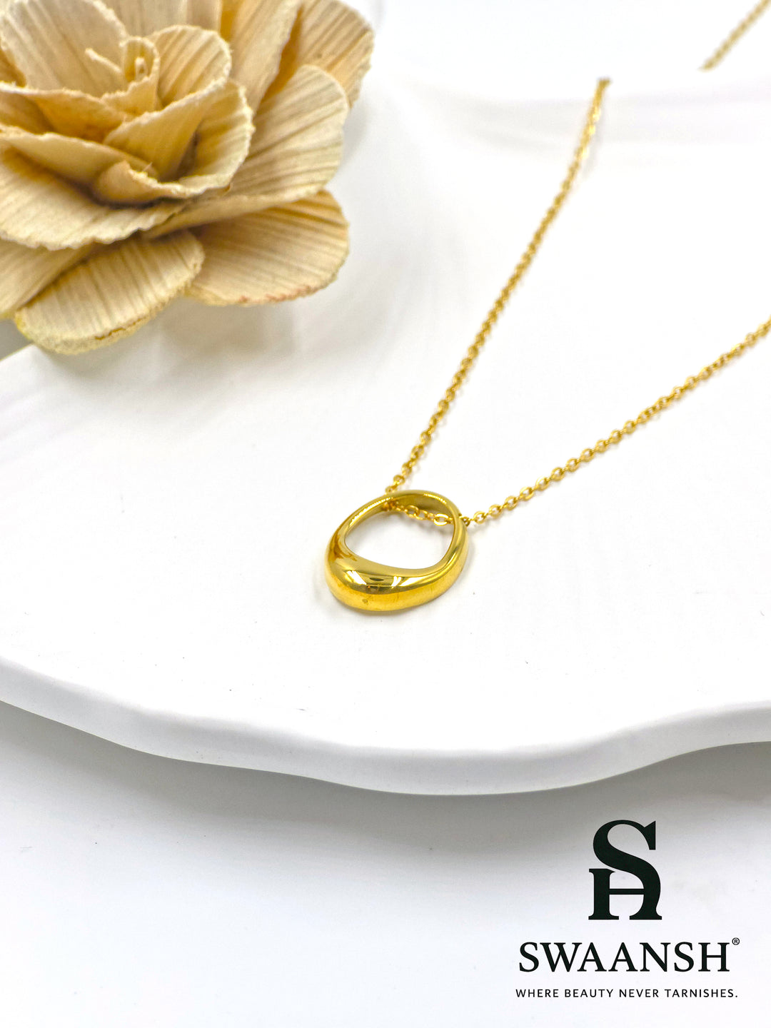 Sculpted gold crescent-shaped loop pendant on delicate chain – Crescent Drape by Swaansh