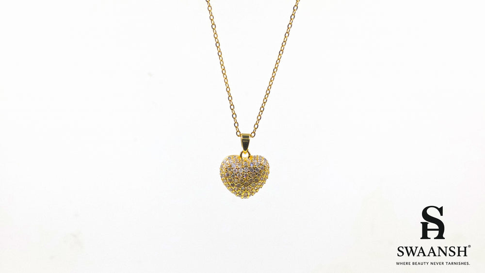 Crowned Heart Pendant by Swaansh featuring pavé crystal-encrusted heart charm on gold-plated chain