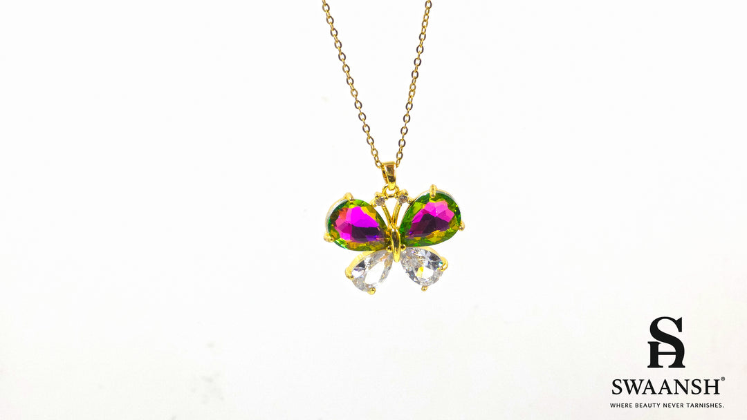 Prism Wings Pendant by Swaansh featuring multicolour iridescent butterfly with gold-plated setting and crystal wings