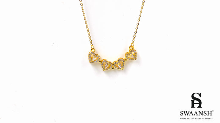Hearts of Fortune Pendant by Swaansh featuring crystal-studded four-leaf clover and heart cascade designs in gold