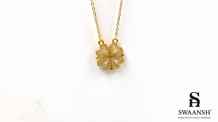 Hearts of Fortune Pendant by Swaansh featuring crystal-studded four-leaf clover and heart cascade designs in gold