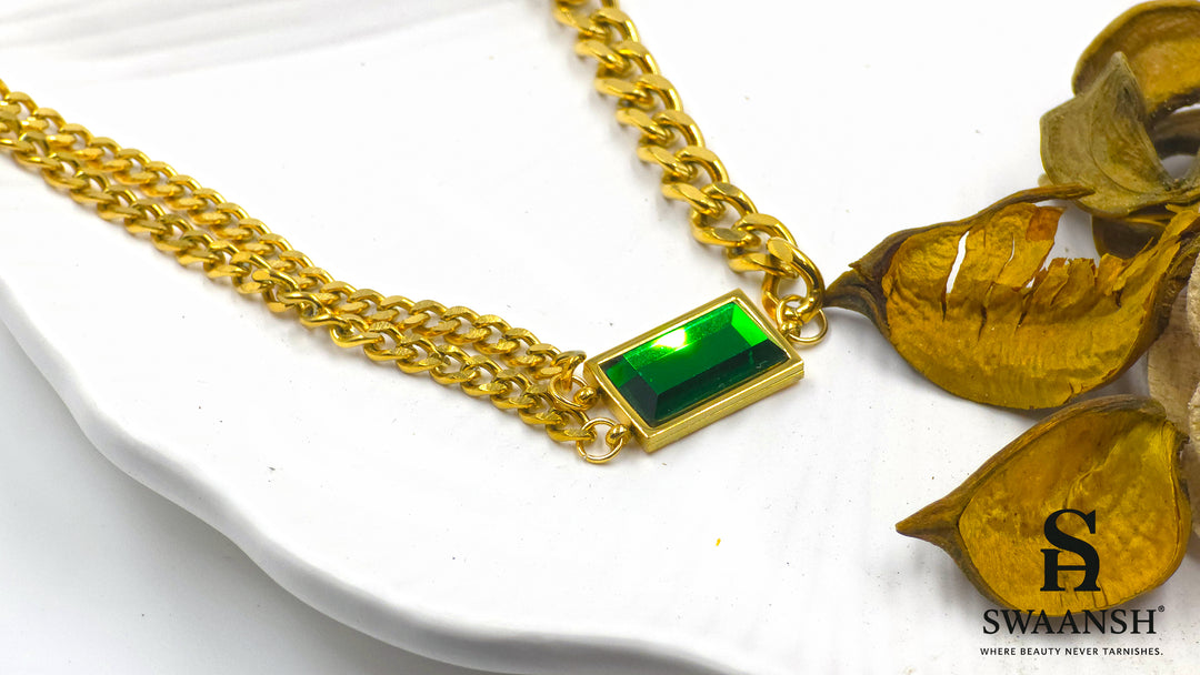 Emerald Edge Pendant by Swaansh featuring bold green rectangular crystal on a twin gold chain