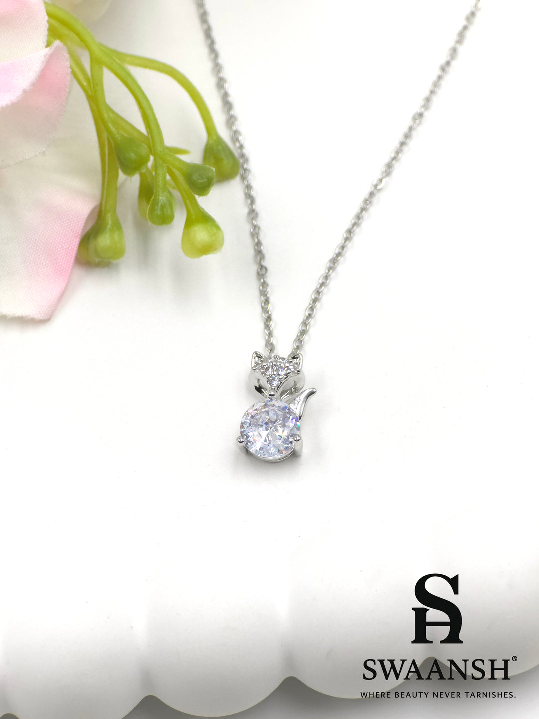 Frost Whiskers Pendant by Swaansh featuring a silver cat-shaped charm with round crystal center and pavé ears