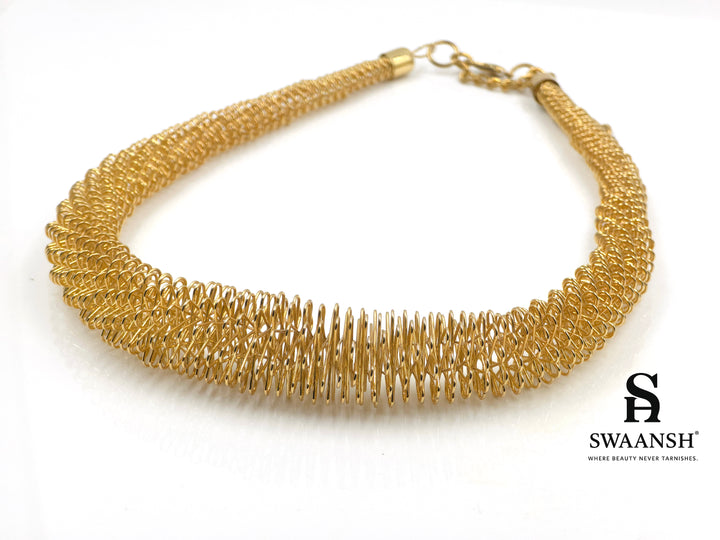Helix Drape Choker by Swaansh featuring sculpted gold mesh coils in a wide choker silhouette