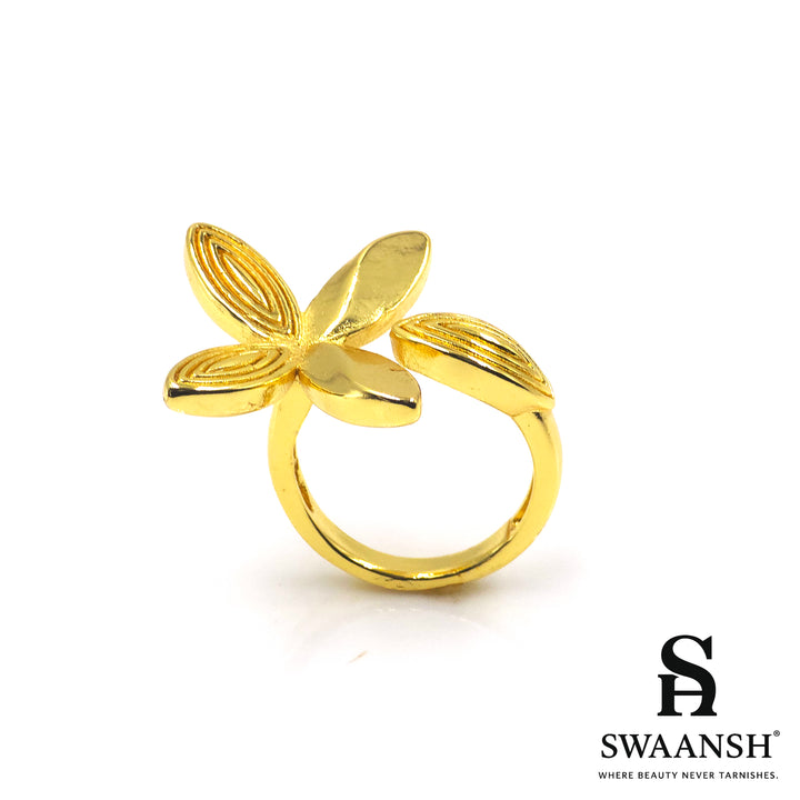 Gold-tone matte floral ring with sculpted four-petal design – Golden Bloom Ring by Swaansh